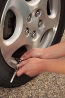 checking tire pressure