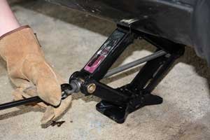 jacking car up to change tire