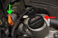 Oil dipstick and reservoir