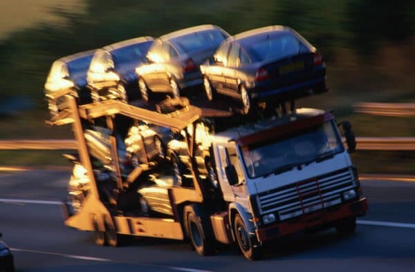 Truck transporting 9 cars at once.