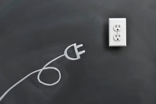 Ideas about clean energy with outlet plate drawn on backboard.