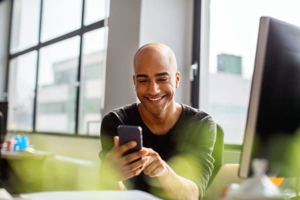 man-looking-at-smartphone