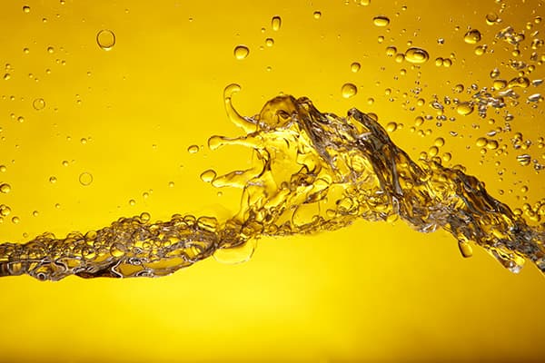 Fuel spilled across a golden background.