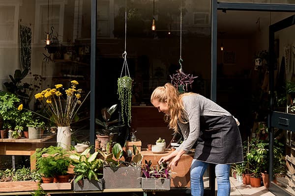 small business owner at storefront