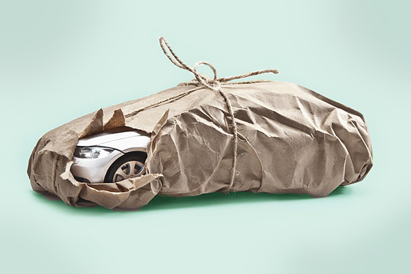 Car wrapped in paper and twine