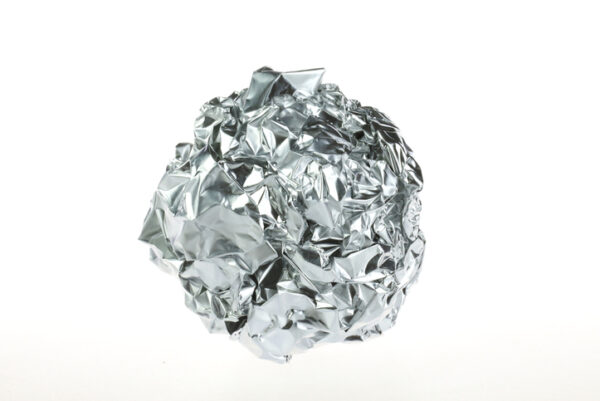 Ball of Aluminum Foil on a white background
