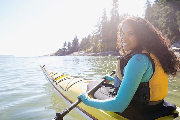 young woman kayaking