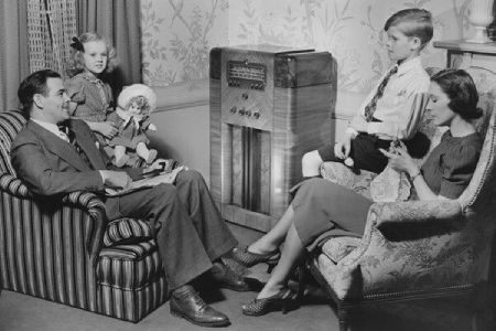 Family listening to radio