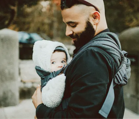 Man holding child.