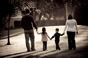 family walking hand in hand