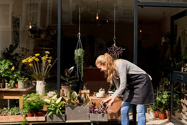small business owner at storefront