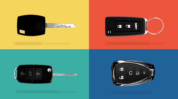 Collage of 4 different types of car keys or key fobs.