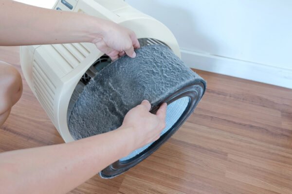 Dirty air-filter being changed.