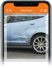 Smart phone with picture of vehicle damage displayed on the screen.