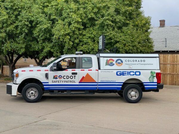 Colorado Department of Transportation truck with the GEICO gecko on the side.