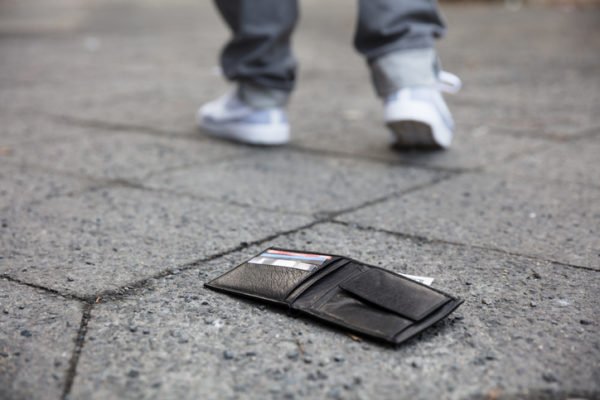wallet-dropped-on-sidewalk