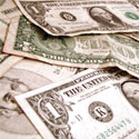 pile of dollar bills