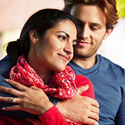 man embracing woman