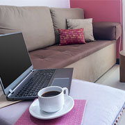 laptop and coffee by the couch