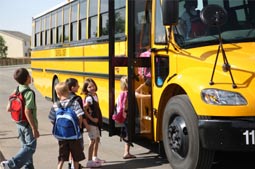 children entering schoolbus